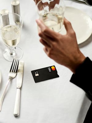 Hand holding M&S Credit Card