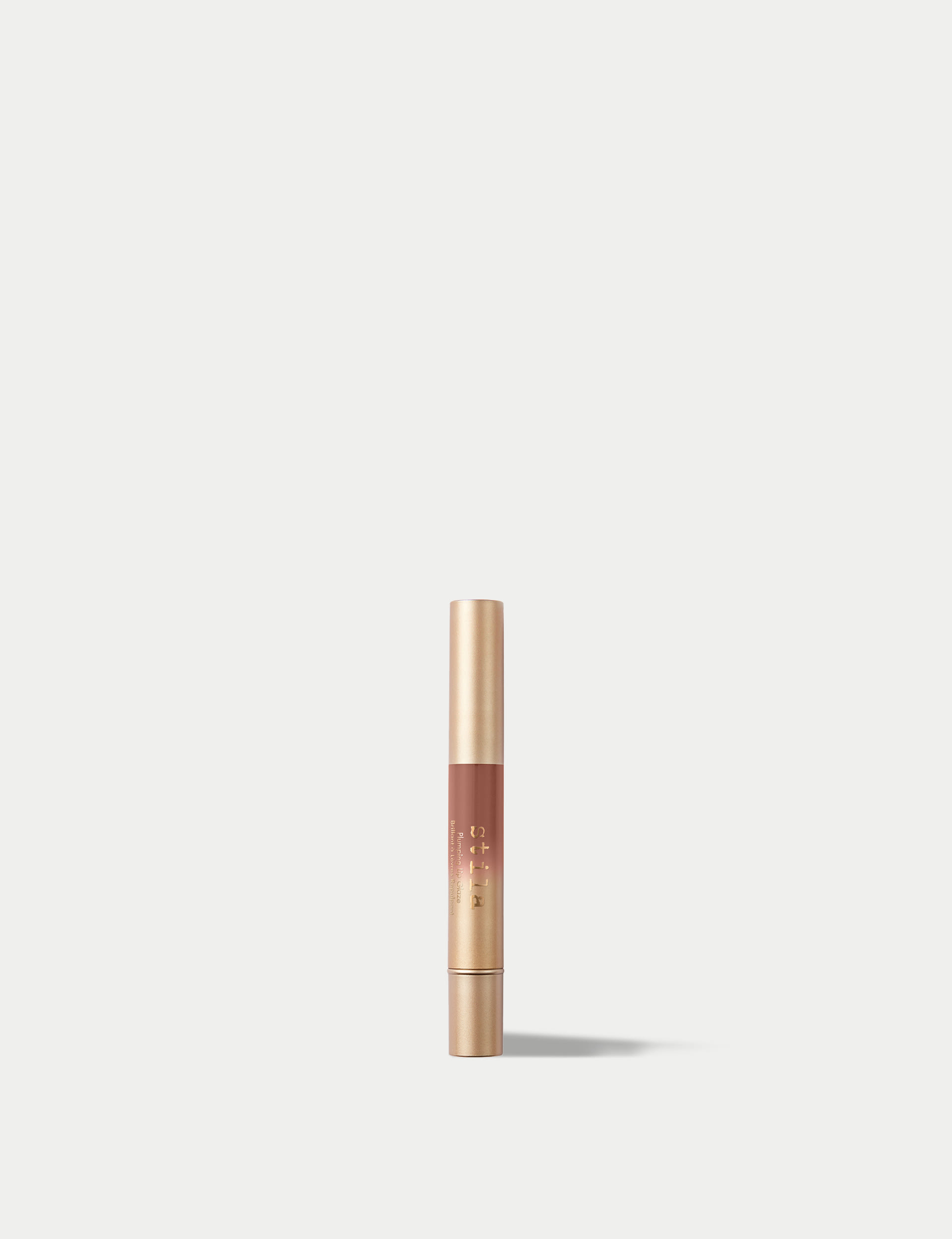 Stila Plumping Lip Glaze 3.5ml - Peach, Deep Red,Brown Suede,Rich Purple,Classic Mix,Light Purple,Light Raspberry,Peach,Burgundy,Brown,Pink Champagne,Magenta,Soft Peach,Maple