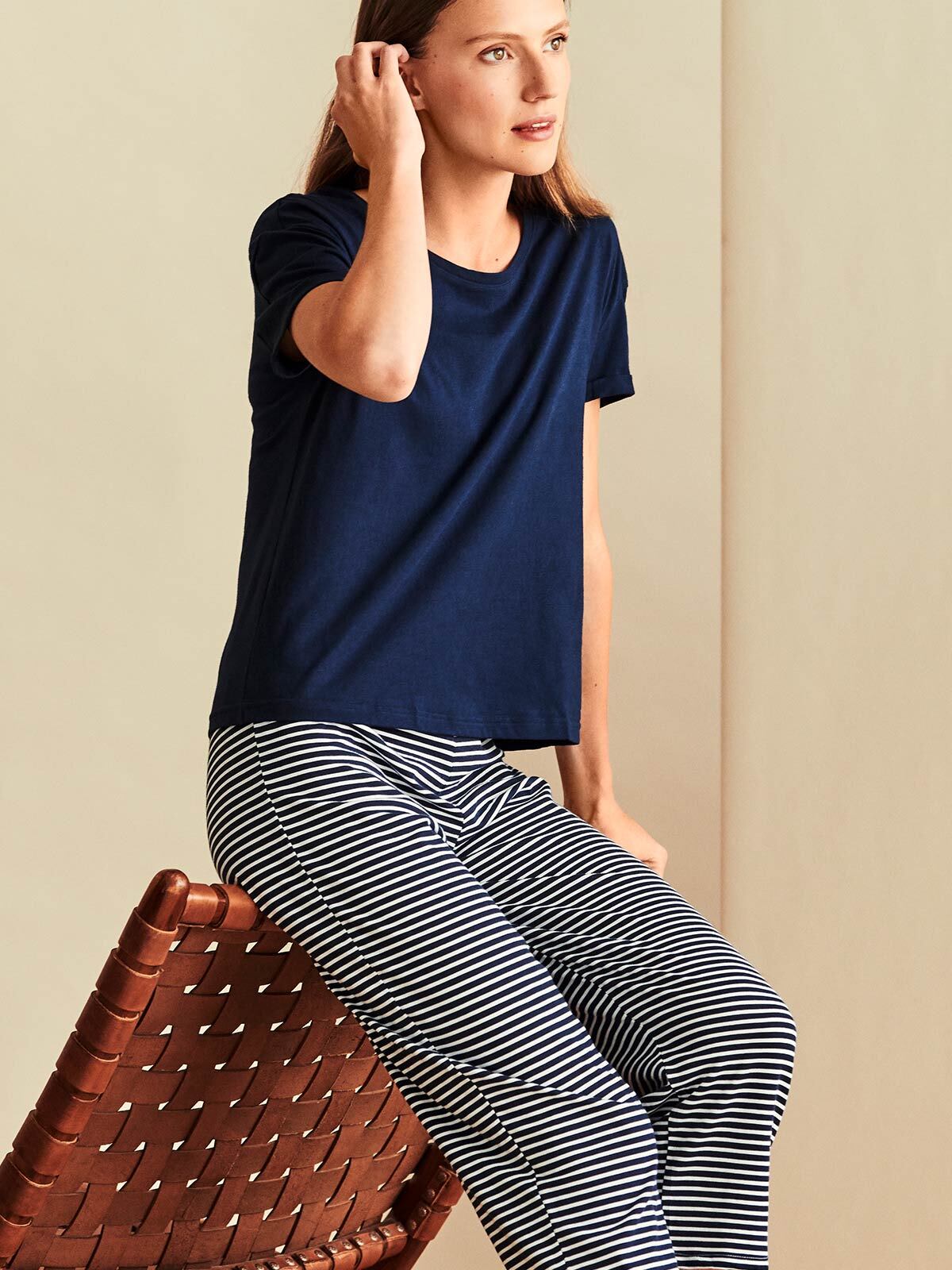 A model wearing a shorts pyjama set