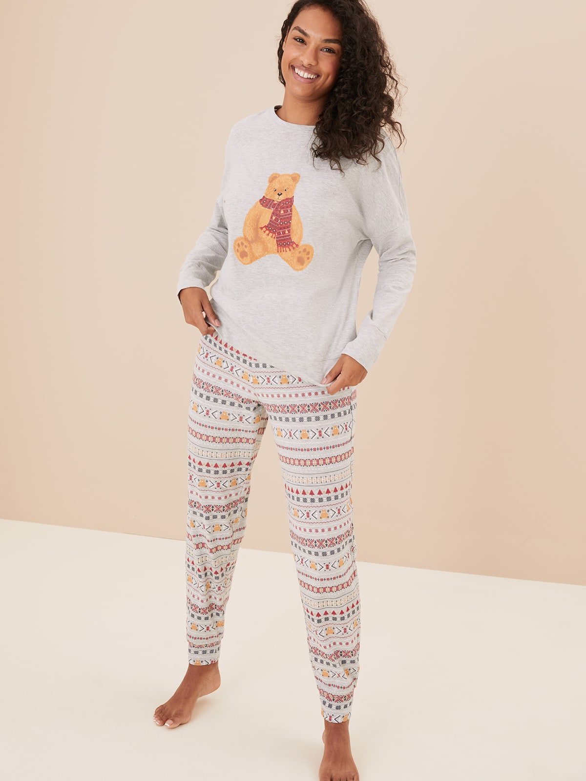 Woman wearing Spencer Bear pyjama set. Shop now 