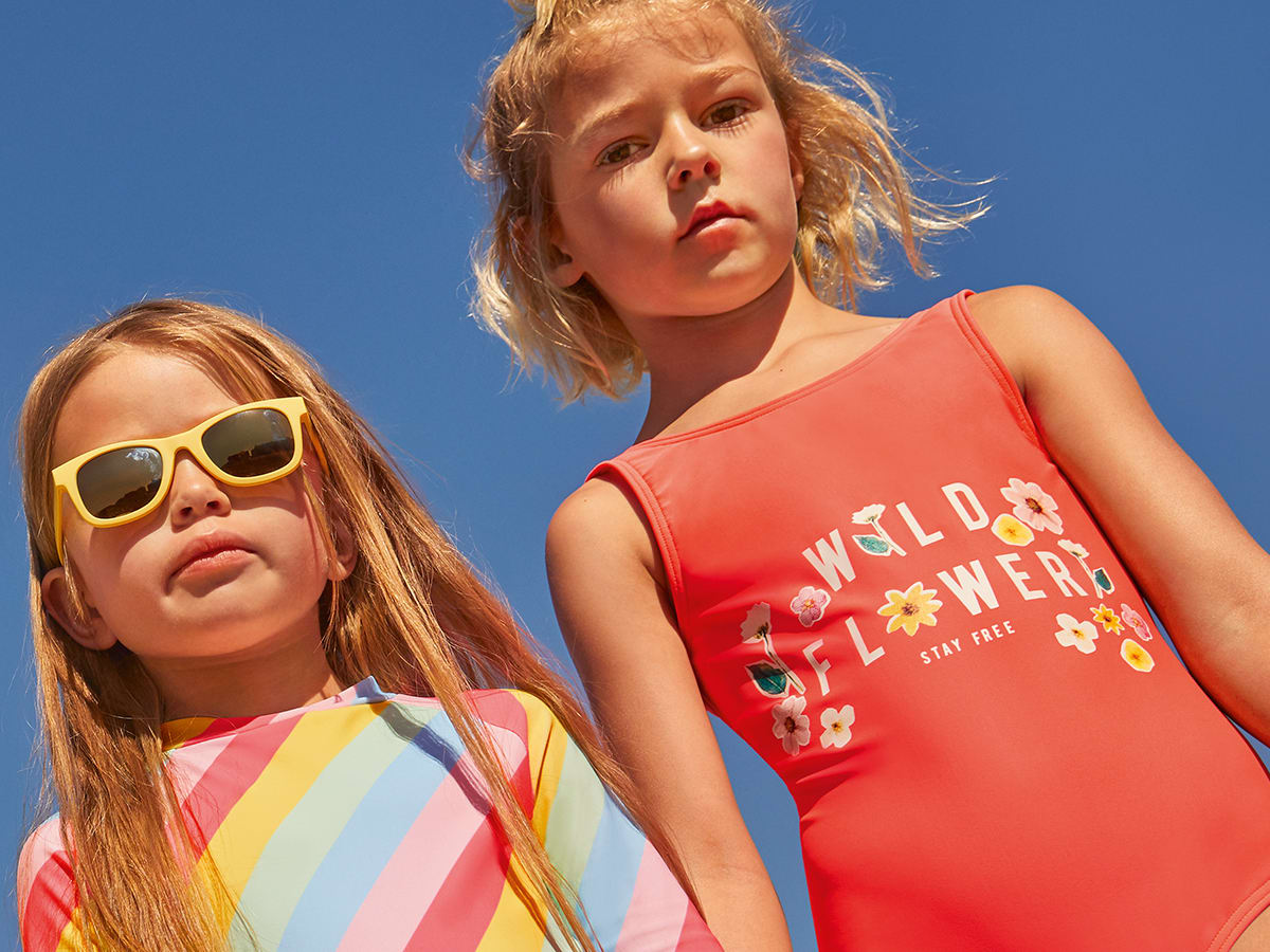 Girls in the sunshine wearing swimsuits