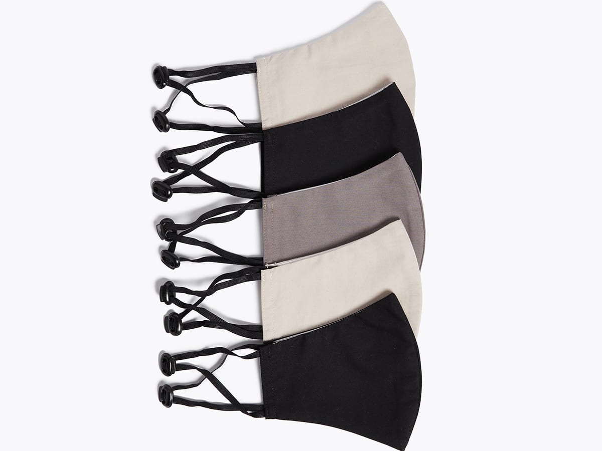 A selection of black, brown and beige face coverings