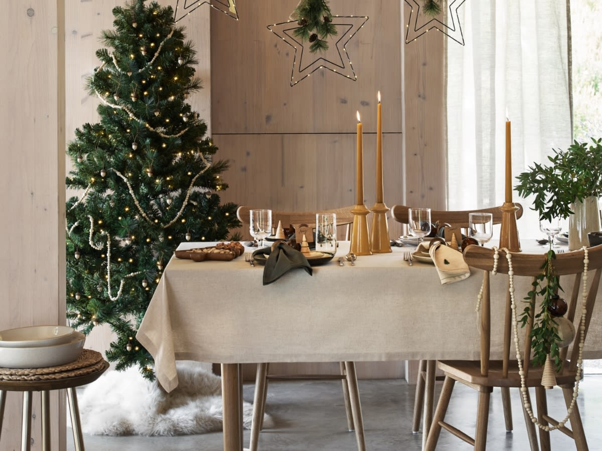 Dining table set with Christmas tableware. Save 10% when you buy a dining table & 2 sets of dining chairs