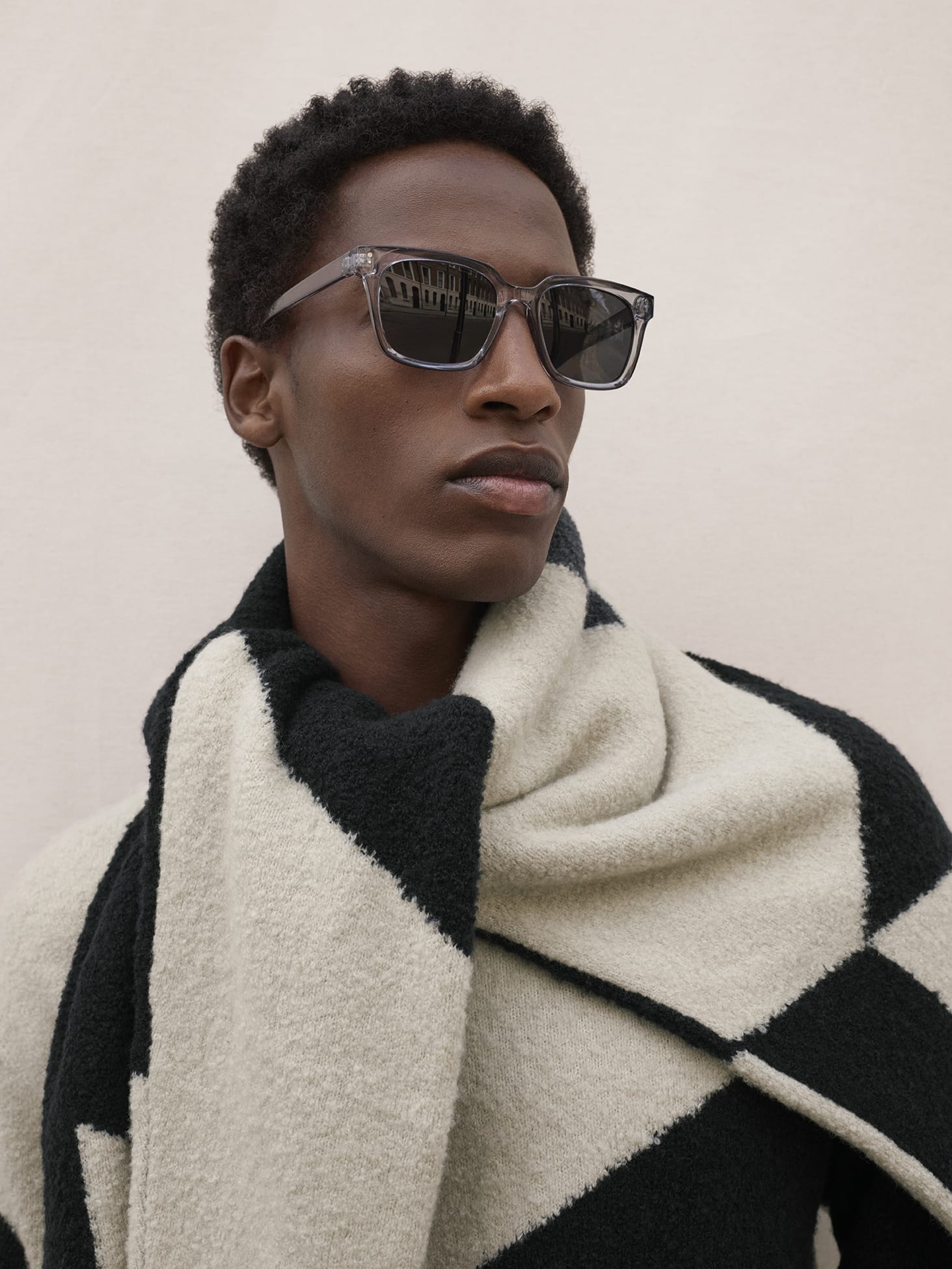 Man with sunglasses and scarf