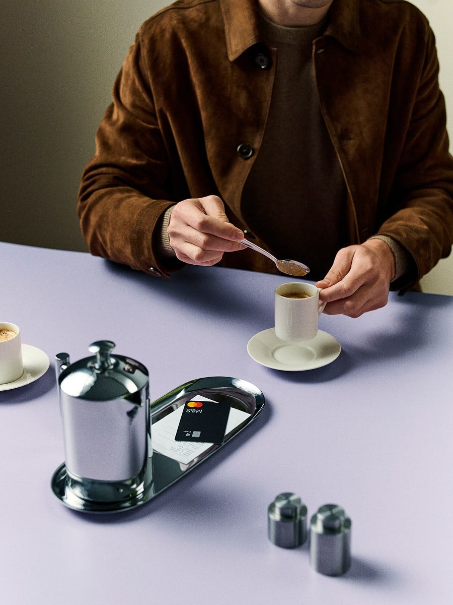 Hand holding a credit card