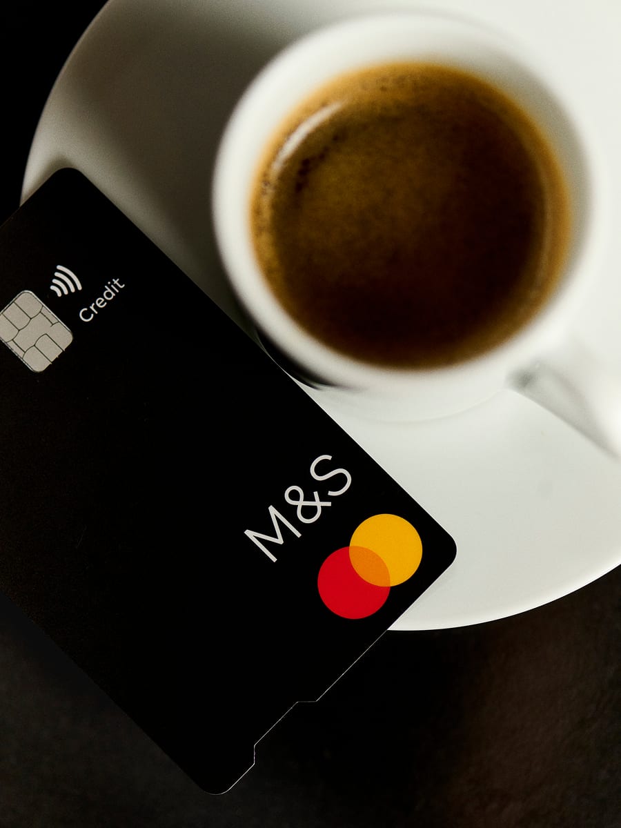 Hand holding a credit card