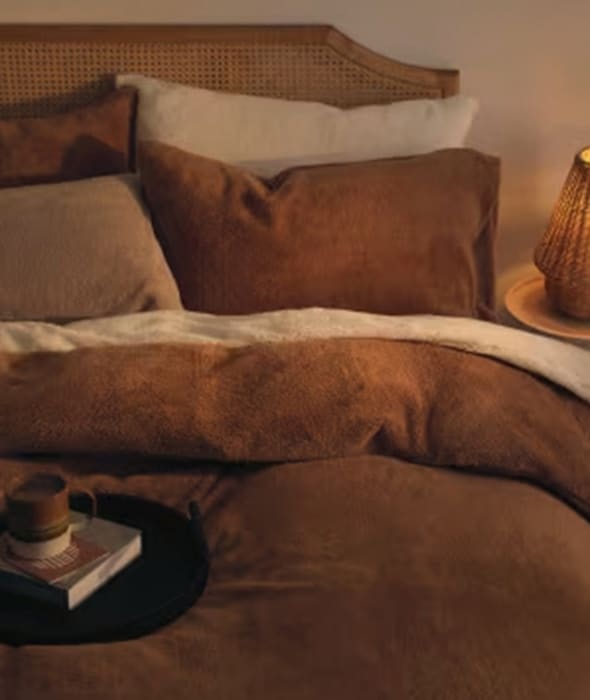 Bed made up with brown teddy fleece bedding set