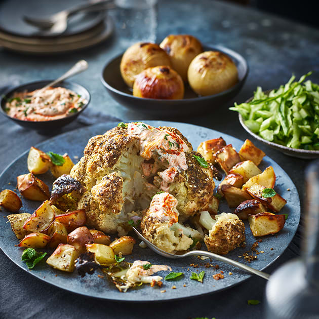 	
ROASTED CAULIFLOWER WITH SLOW-COOKED ONIONS AND GREENS