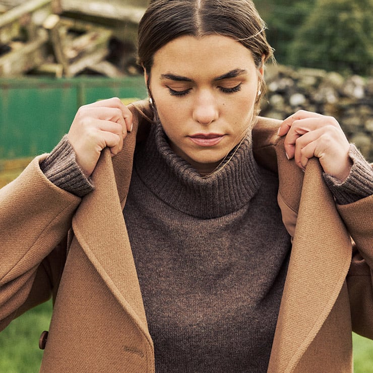 Women wearing a coats . shop women brands
