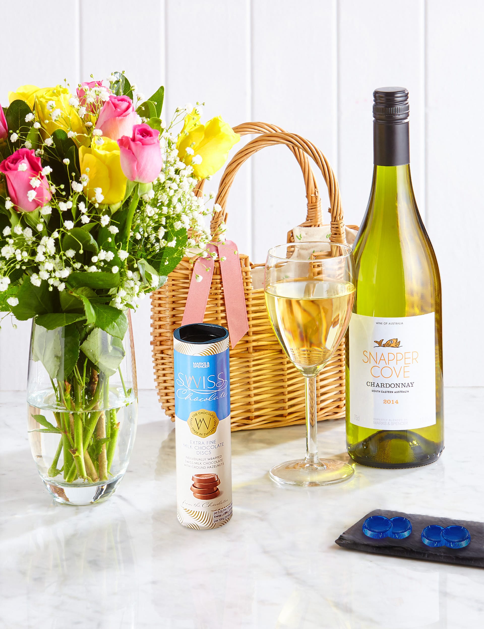 A Basket of Treats with a Posy of Flowers Image 1 of 2