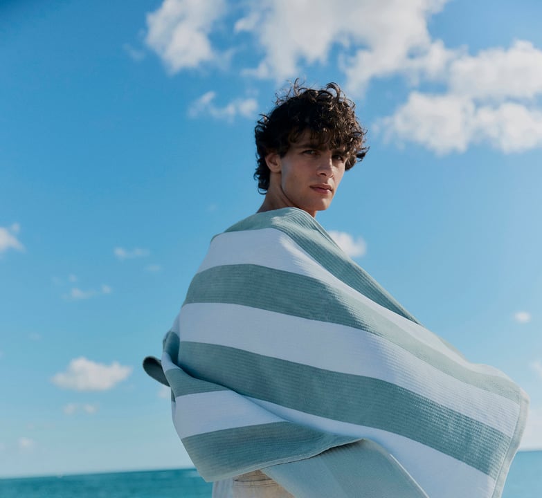 A dramatic coastal landscape with stormy ocean scene