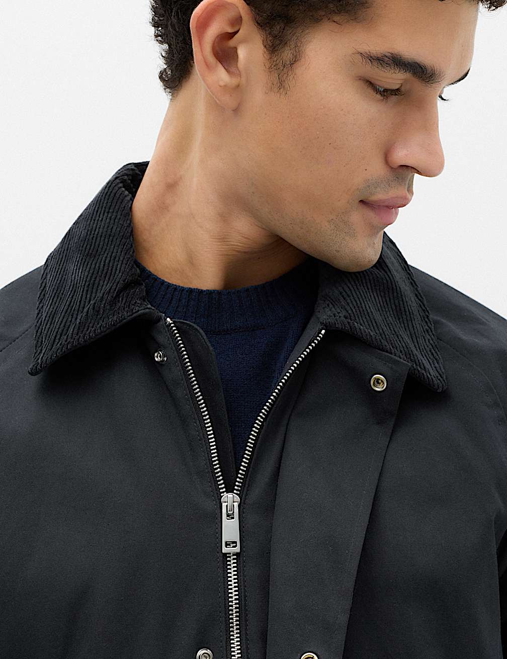 Close-up of the Marks & Spencer wax jacket's corduroy collar and zip front