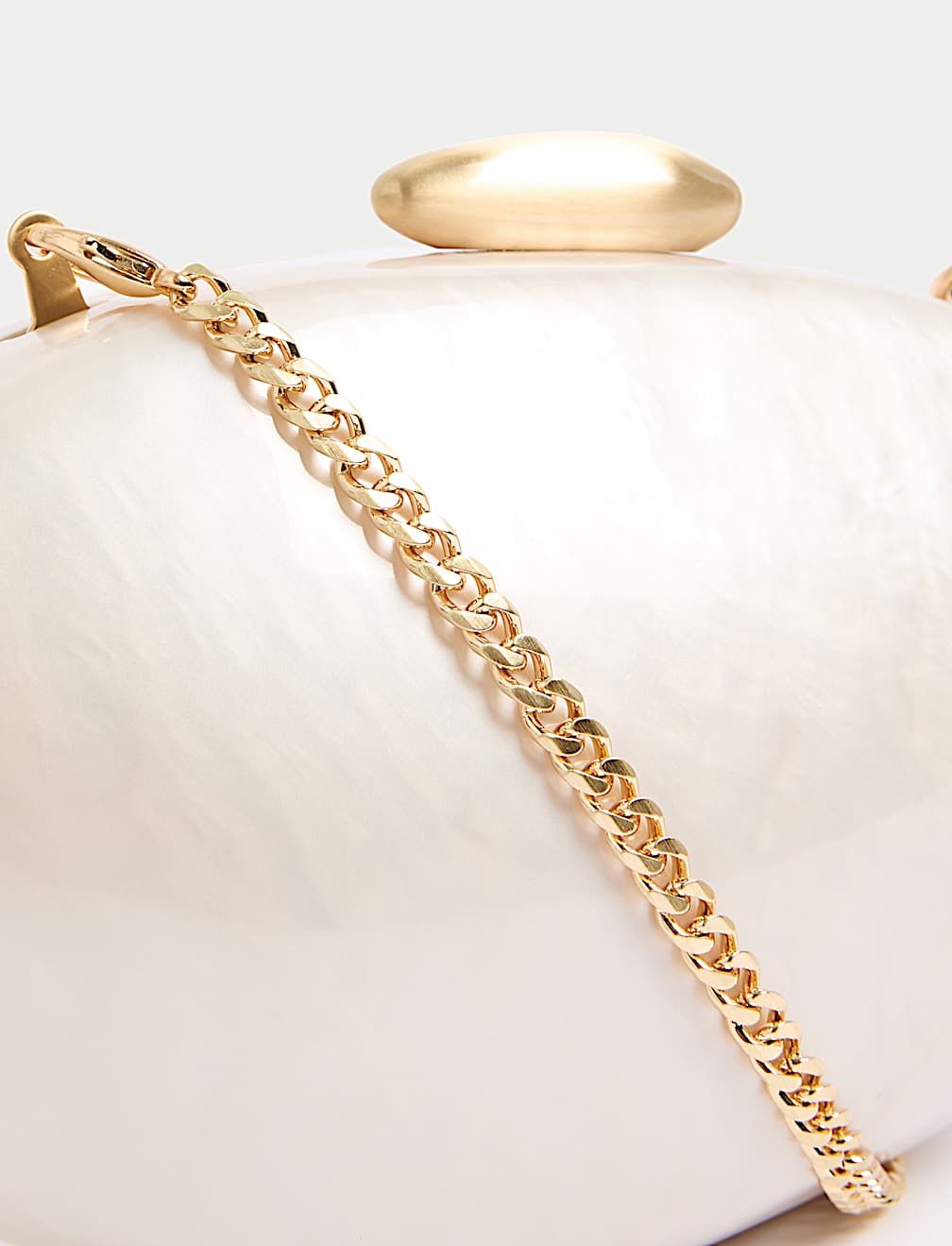 PEARL EFFECT CLUTCH BAG