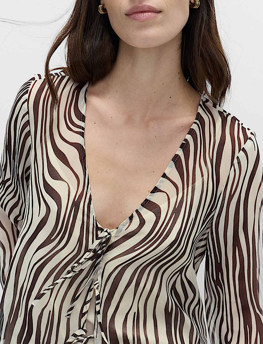 Zebra Print Tie Front Flute Sleeve Blouse