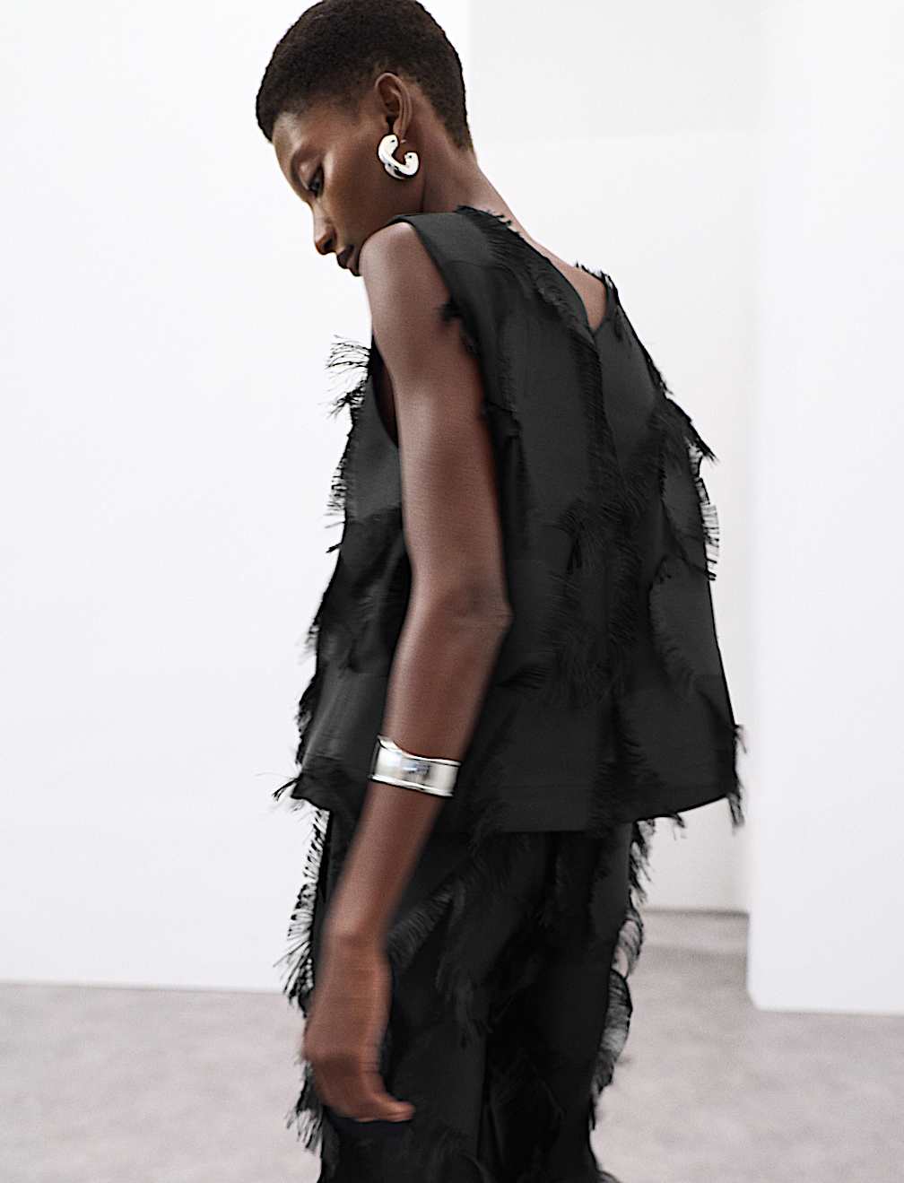 Relaxed Fringe Twist Back Detail Top