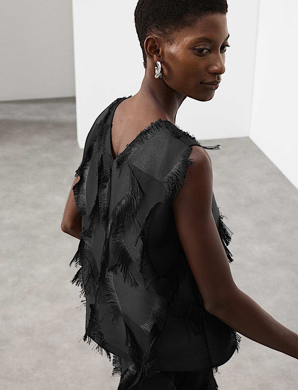 Relaxed Fringe Twist Back Detail Top