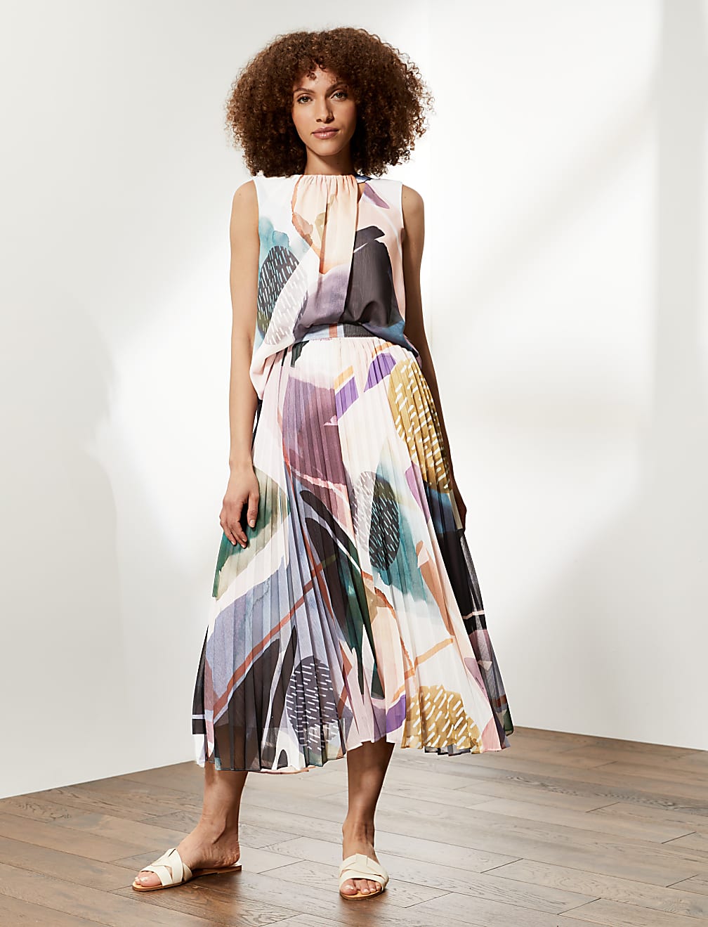 Draped Printed Sleeveless Blouse
