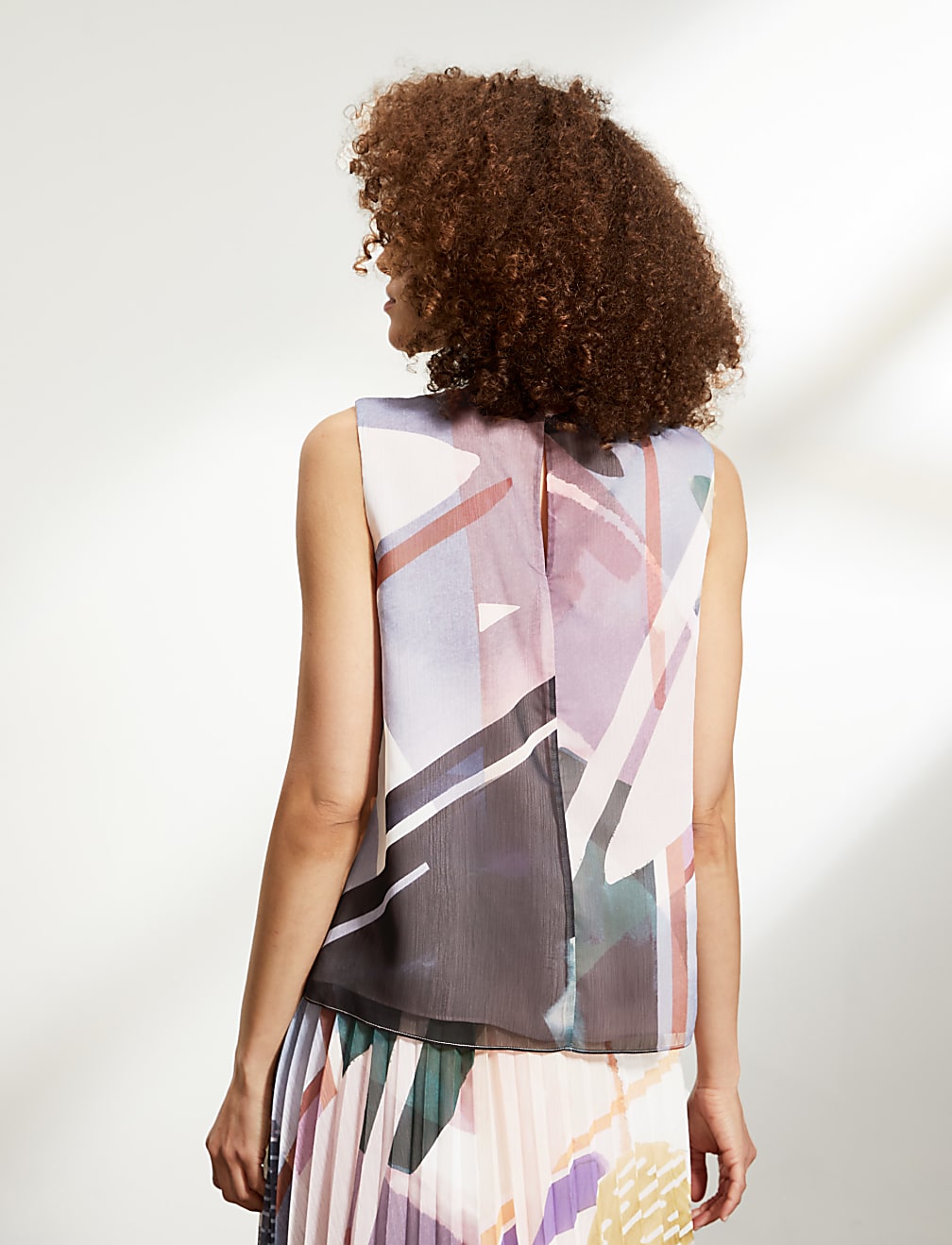 Draped Printed Sleeveless Blouse