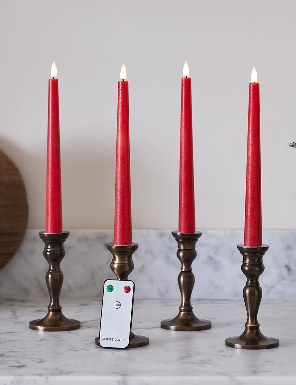 Lights4fun Set of 4 TruGlow LED Taper Candles Red