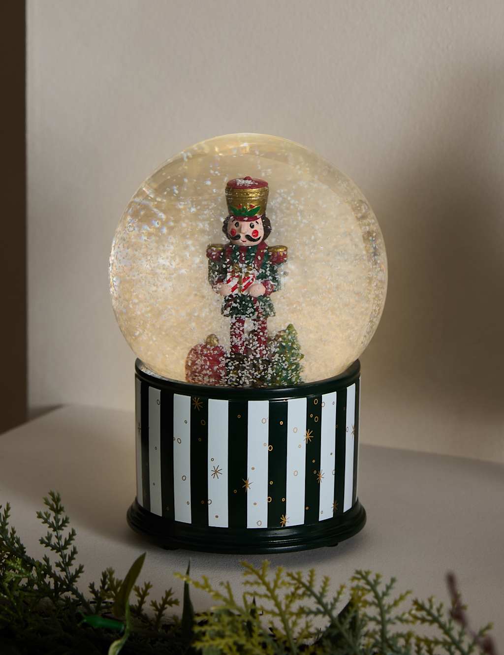 M&S Light Up Musical Nutcracker Snow Globe Red Mix
