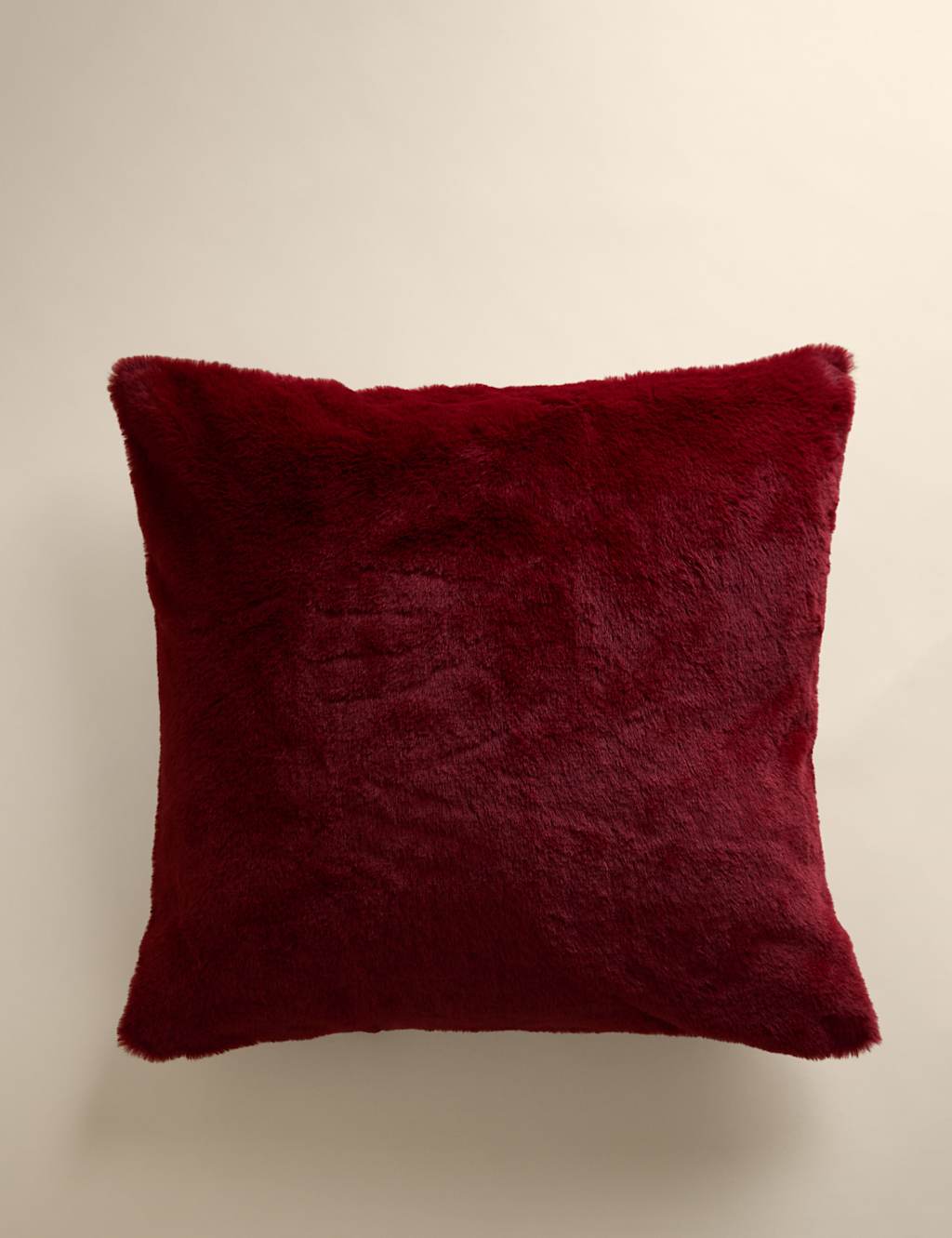 M&S Supersoft Faux Fur Cushion Deep Red