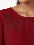 embroidered frill top
