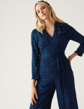 Star Print Tie Neck Belted Jumpsuit