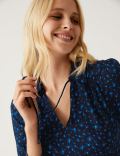 Star Print Tie Neck Belted Jumpsuit