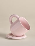 Taza con burbujas y posavasos 