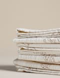 Lot de 4&nbsp;serviettes de table 100&nbsp;% coton avec imprimé xylographié