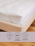 Surmatelas garni de duvet et de plumes d’oie