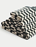 Serviette 100&nbsp;% coton à motif géométrique carreau