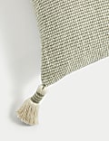 Coussin 100 % coton à motif texturé et pampilles