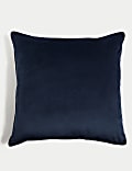 Grand coussin en velours à passepoil