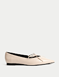 Platte pumps met spitse neus en strik