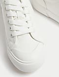 Canvas sneakers met veters en oogdetail