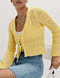 Cardigan coupe raccourcie en coton m&eacute;lang&eacute; en maille pointelle et col en V nou&eacute; sur le devant