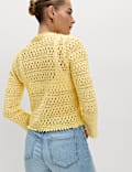 Cardigan coupe raccourcie en coton m&eacute;lang&eacute; en maille pointelle et col en V nou&eacute; sur le devant