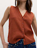 Chaleco corto de punto con cuello en pico