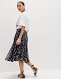 Polka Dot Asymmetric Hem Midi Skirt