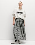 Jupe évasée midaxi plissée à carreaux