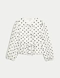 Chemisier à manches bouffantes et motif pois à nouer sur le devant