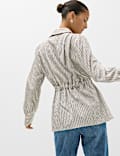 Camisa de rayas con detalle de lazo en la cintura