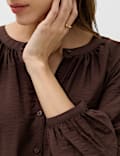 Durchgekn&ouml;pfte Bluse mit Kordelzug