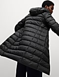 Manteau molletonné rembourré, garni de plumes et de duvet