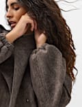 Chaqueta b&oacute;mber texturizada con cuello chimenea