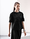 Zuiver katoenen blouse met ronde hals, korte mouwen en borduursel