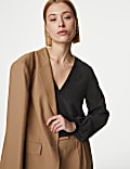 Blouse 100 % soie à col en V et boutons-pression