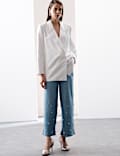 Jean taille haute coupe large en denim avec ornements