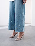 Jean taille haute coupe large en denim avec ornements